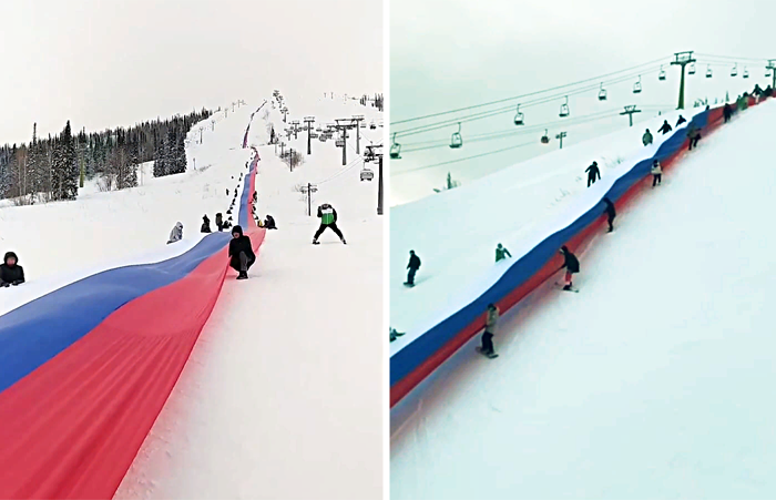 В Шерегеше побили рекорд – на горе Зеленая развернули самый длинный флаг России