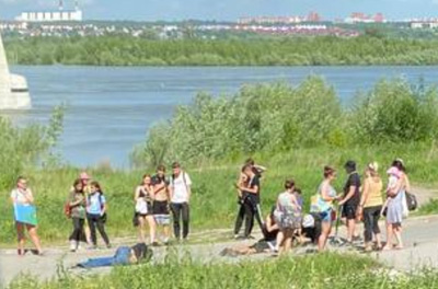 В Новосибирске упавший с Бугринского моста мужчина покалечил подростка. Фото с места события
